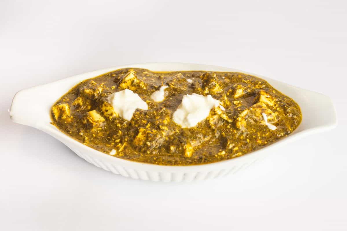 Palak Panner topped with cream