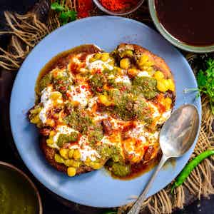 Samosa,Deep fried crispy flour snack with savoury filling of spiced potatoes, onions and peas