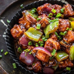 Paneer 65, Fried panner cubes tossed in spicy Indian curry sauce