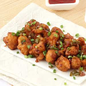 Gobi Manchuria, Fried crispy cauliflower florets tossed in sweet, sour and hot manchurian sauce